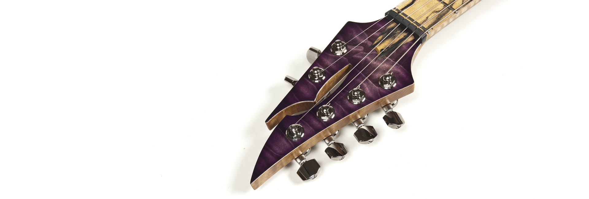 Equilibrium 6-string "split" headstock with a quilt maple purpleburst gloss finish on a roasted flame maple neck with a pale moon ebony fretboard and ruthenium Schaller locking M6 tuners